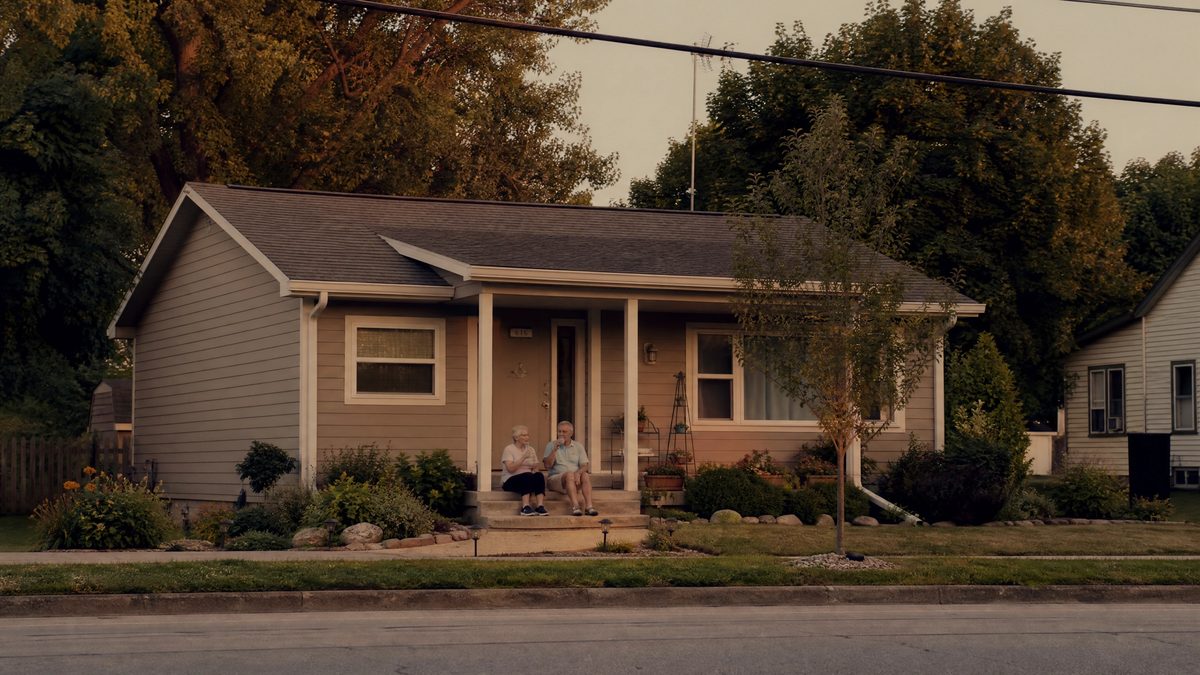 A couple relaxing on their new porch
